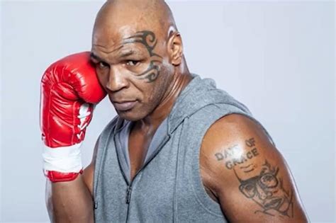 A Guide To Six Mike Tyson Tattoos and What They Mean