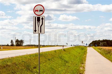 Divided highway begins, keep to the right | Stock image | Colourbox