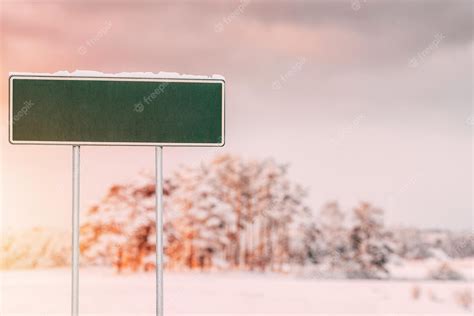 Premium Photo | Empty road sign in winter