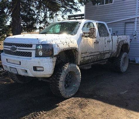 lifted Chevrolet Silverado truck white | Chevy trucks, Lifted chevy ...