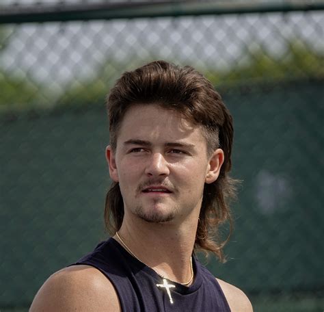 Breaking: J.J. Wolf's mullet bites the bullet | Tennis.com