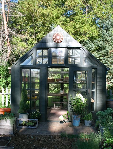 Beautiful modest black greenhouse with brick floor and nice decor. A ...