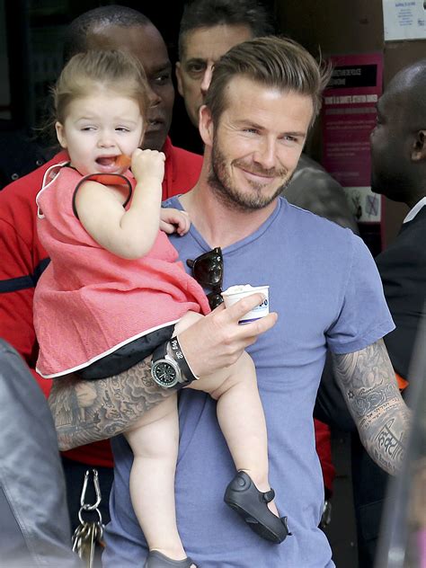 David Beckham held on to his daughter, Harper Beckham, in Paris | May's ...