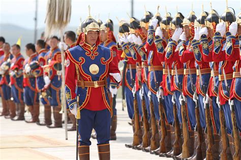 Members of the Mongolian Armed Forces 234 Cavalry Unit prepare to give ...