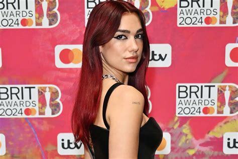 Dua Lipa Attends 2024 BRIT Awards Red Carpet: Photos