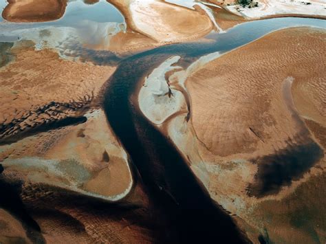 Aerial View of Water on the Beach · Free Stock Photo