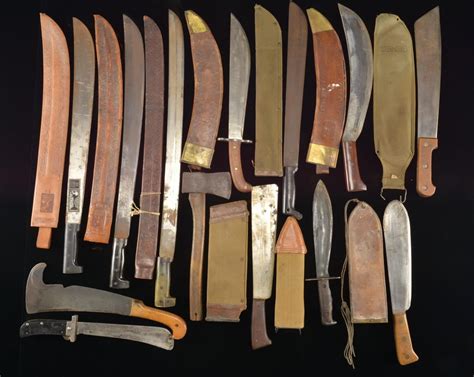 33 MOSTLY US MACHETES & BOLO KNIVES.