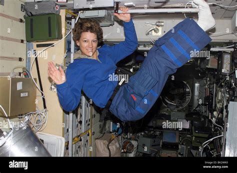 Astronaut Eileen M. Collins weightless and floating in STS-114 ISS ...