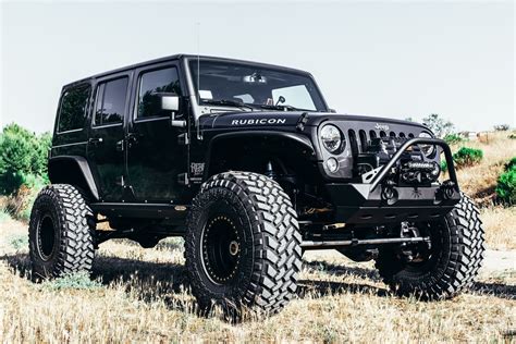 Perfect Fitment of Nitto Tires on Custom Black Lifted Jeep Wrangler ...