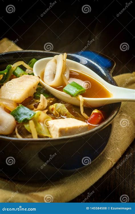 Korean Seafood Stew stock photo. Image of daikon, chopsticks - 145584508