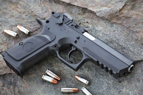 Magnum Research Baby Eagle III Semiauto 9mm Pistol: Full Rev - Handguns