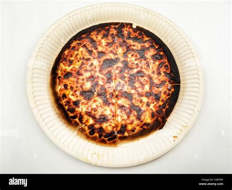 Burnt cheese pizza hi-res stock photography and images - Alamy