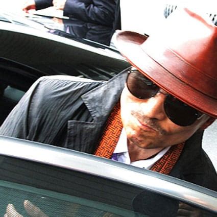 Japan woman sues yakuza boss Kenichi Shinoda over protection money ...