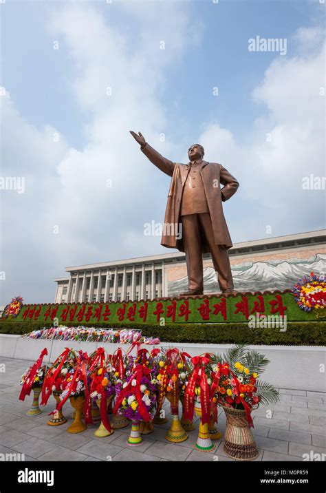 Flowers in front of Kim il Sung statue in Mansudae Grand monument ...