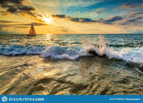 Sunset Ocean Sailboat stock photo. Image of nature, landscape - 217139532