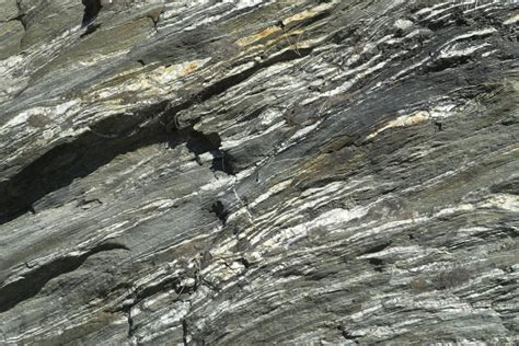 Transposed quartz veins in schist – Geology Pics