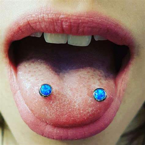 Venom Piercing [50 Ideas]: Pain Level, Healing Time, Cost, Experience ...