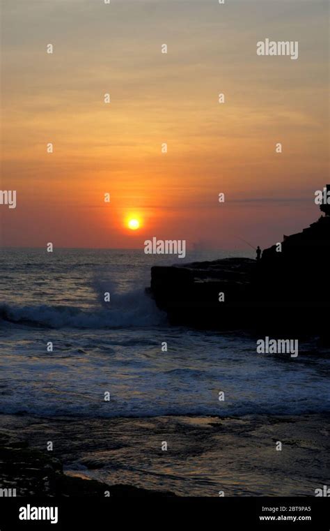 Sunset at Uluwatu Beach in Bali Stock Photo - Alamy