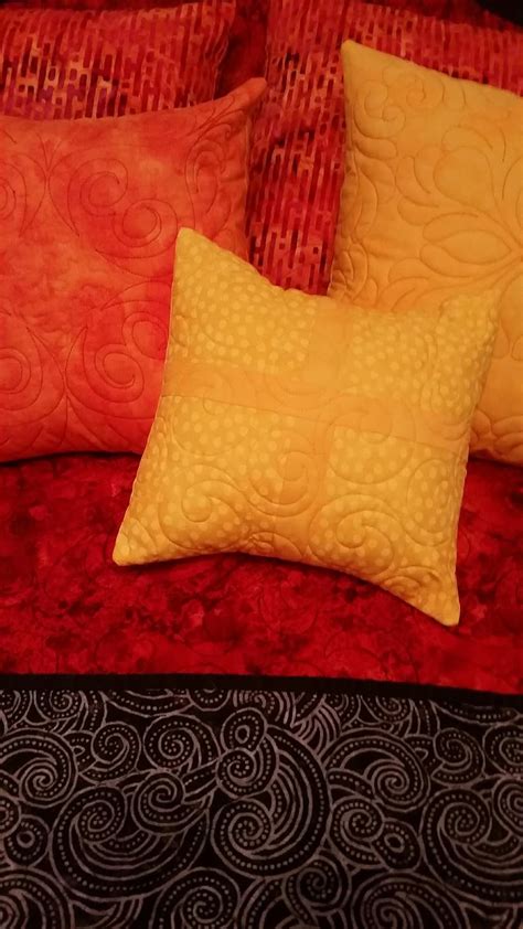 Millie's Quilting: Red quilt and orange and yellow pillows