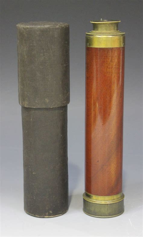 A late 19th century mahogany and lacquered brass three-draw telescope ...