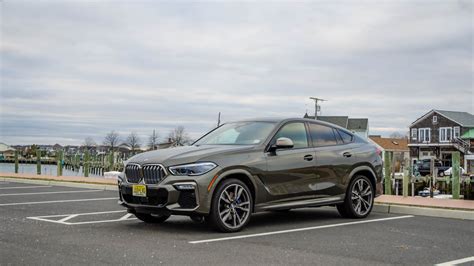 Le BMW X6 M50i bat le Porsche Cayenne Turbo en course de dragsters ...