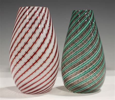 Two Murano glass vases, mid-20th century, the first with spirals of ...