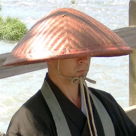 Buddhist Monk Wearing 'takuhatsugasa' Woven Rice-straw Kasa Hat And ...