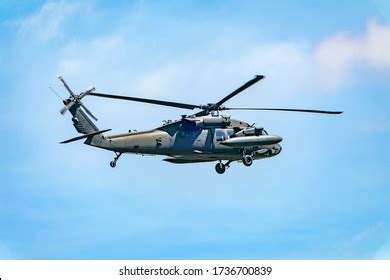 Green Military Helicopter Against Blue Sky Stock Photo 1736700839 ...