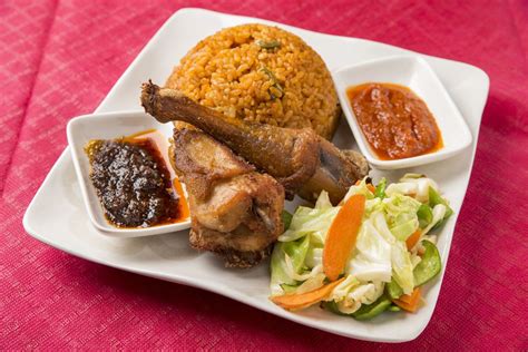 Ghanaian Jollof Rice & Chicken | African food, Food, Ghanaian food