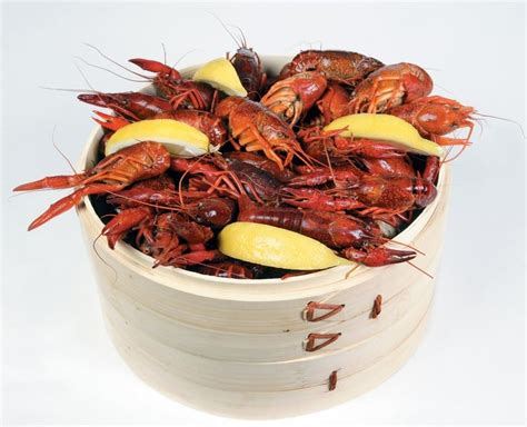 Crawdad with Lemon Wedges in Steamer - Prepared Food Photos, Inc.