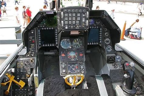 the cockpit of an airplane with many instruments