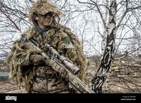 British sniper with his L115A3 long range sniper rifle on exercise in ...