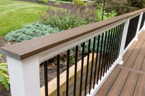 White vinyl railing with black aluminum balusters | Deck designs ...