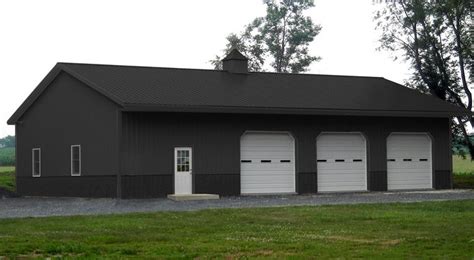 a two car garage with three windows on the side