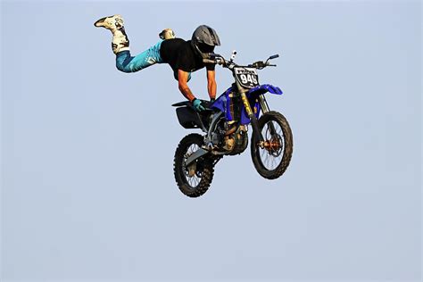 Dirt Bike Stunts - In The Air VI Photograph by Debbie Oppermann