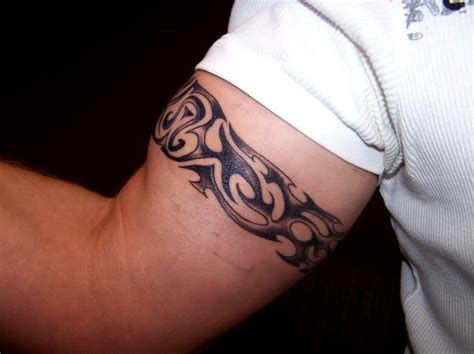 Tattoo Design On Biceps | Tatuagem bracelete masculino, Tatuagem ...