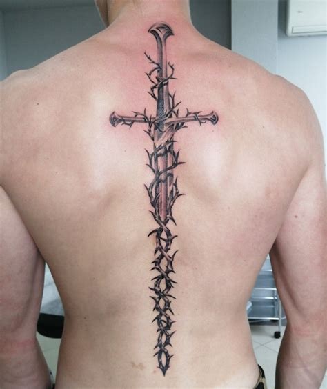 Aragorn Sword Tatoo | Back tattoos for guys, Spine tattoo for men, Hand ...