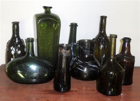 Early black glass bottles. From 1600 to l840's.. Both American and ...