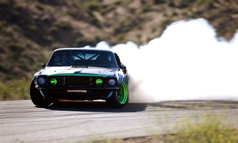 Dynamic Drift: HD Wallpaper of a Powerful Vehicle in Action