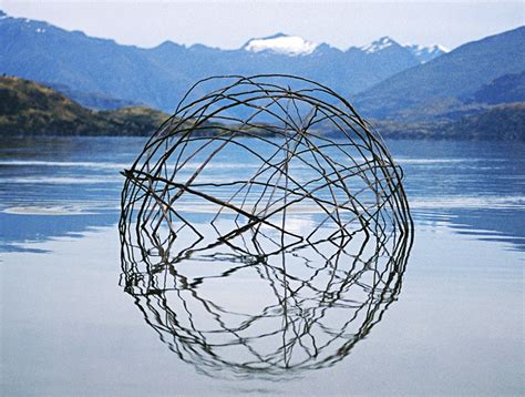 Spectacular Land Art Sculptures Made From Sticks and Stones Reflect ...