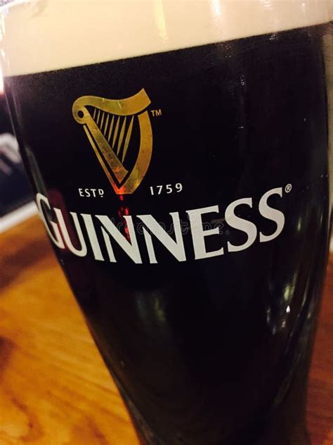 A pint of Guinness editorial stock photo. Image of iron - 81397013