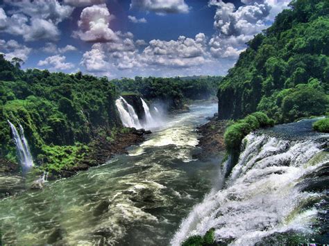 Iguazu Falls: Majestic Cloudy Sky - HD Wallpaper