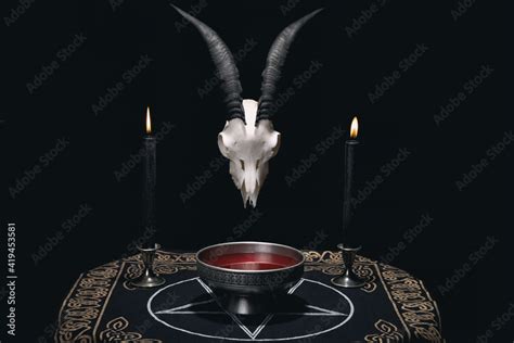 Altar for satanic rituals. Witchcraft composition with goat skull ...