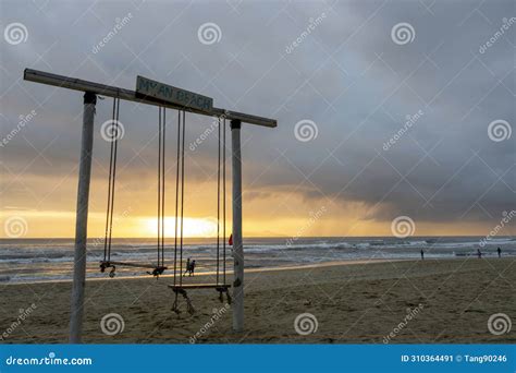 Sunrise on the My Khe Beach in Vietnam with Swing in Silhouette Stock ...