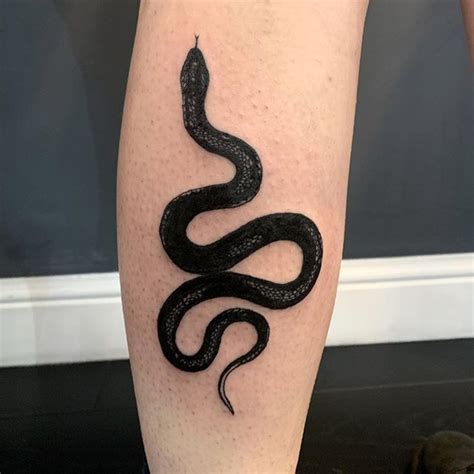 Black Snake Tattoo | Black snake tattoo, Snake tattoo, Snake tattoo design