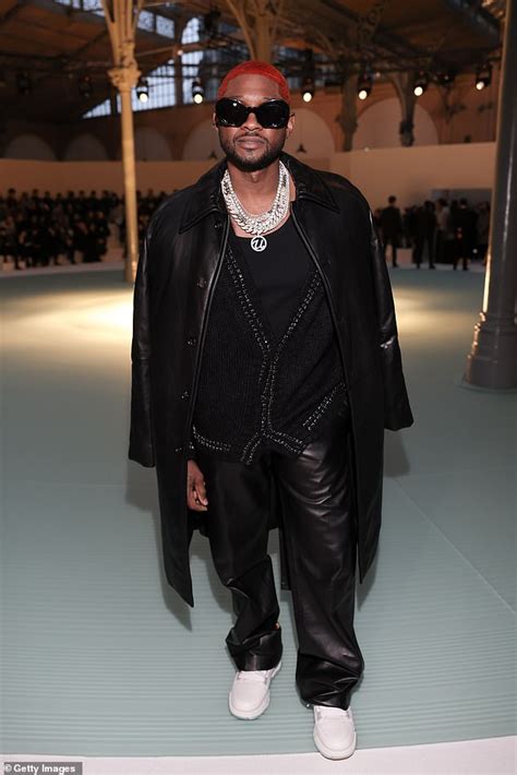 Usher showed off his bright red hairdo at Amiri’s show during Paris ...