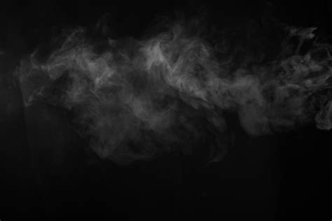 Premium Photo | White smoke over black background for overlay design