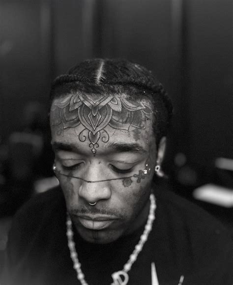 Lil Uzi Vert shows off new tattoos on forehead and tongue