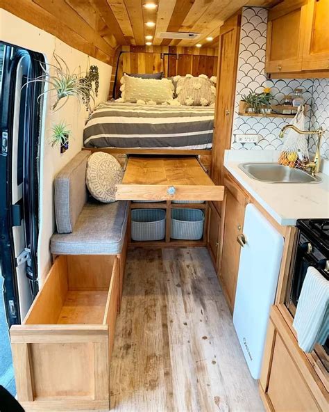 How awesome is all this extra storage in this converted van? 😍 We would ...