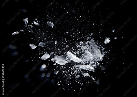 Ice broken isolated on a black background Stock Photo | Adobe Stock